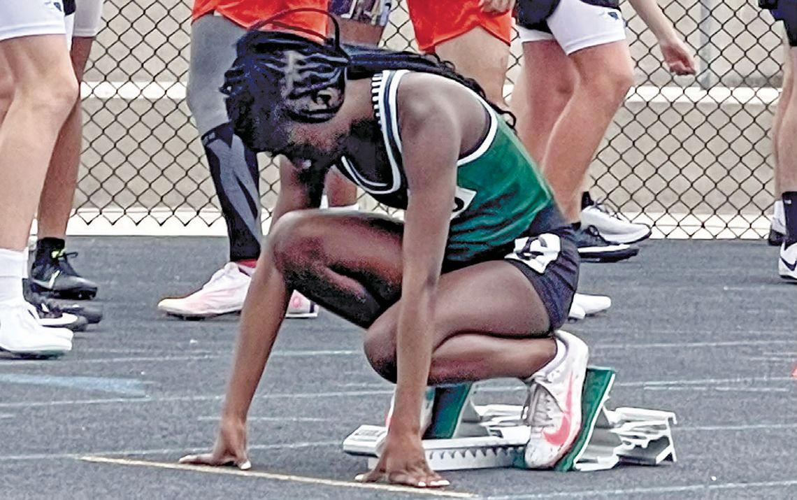 Zakaya Frederick getting set in the starting block before the starting pistol fires for the 400-meter. Courtesy Photo