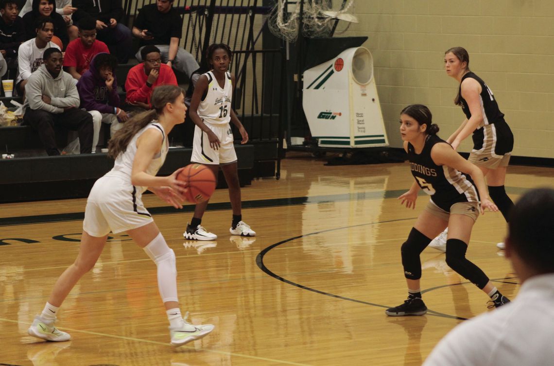 Lady Ducks sophomore and leading scorer Sophia Fisher makes a move to get past a Giddings Lady Buffalo defender on her way to the basket.