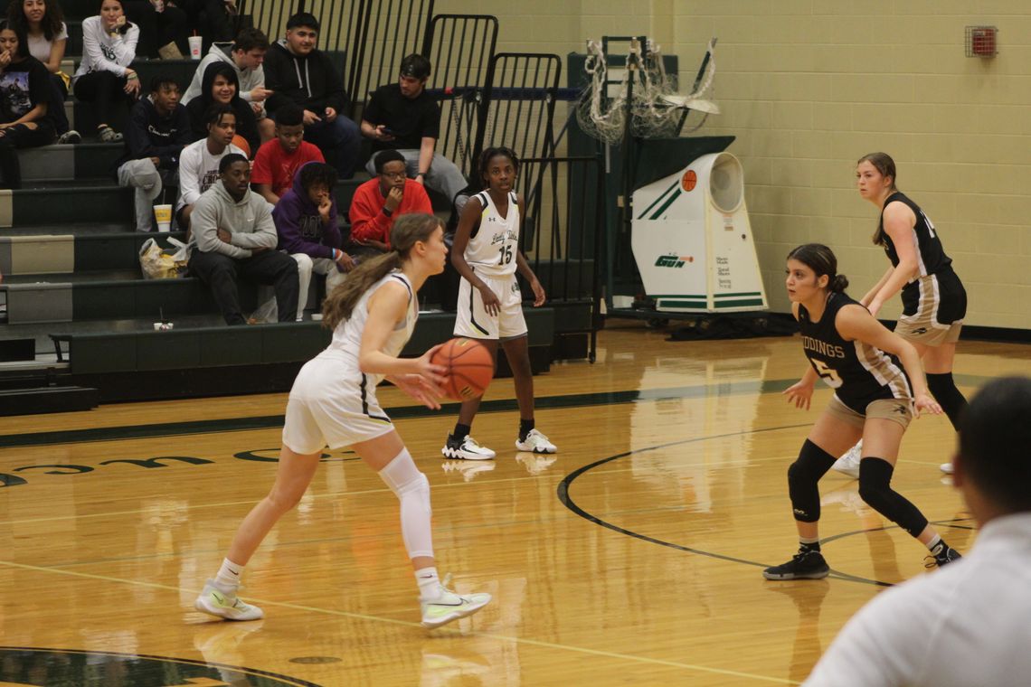 Lady Ducks sophomore and leading scorer Sophia Fisher making a move to get past a defender and drive to the basket. 