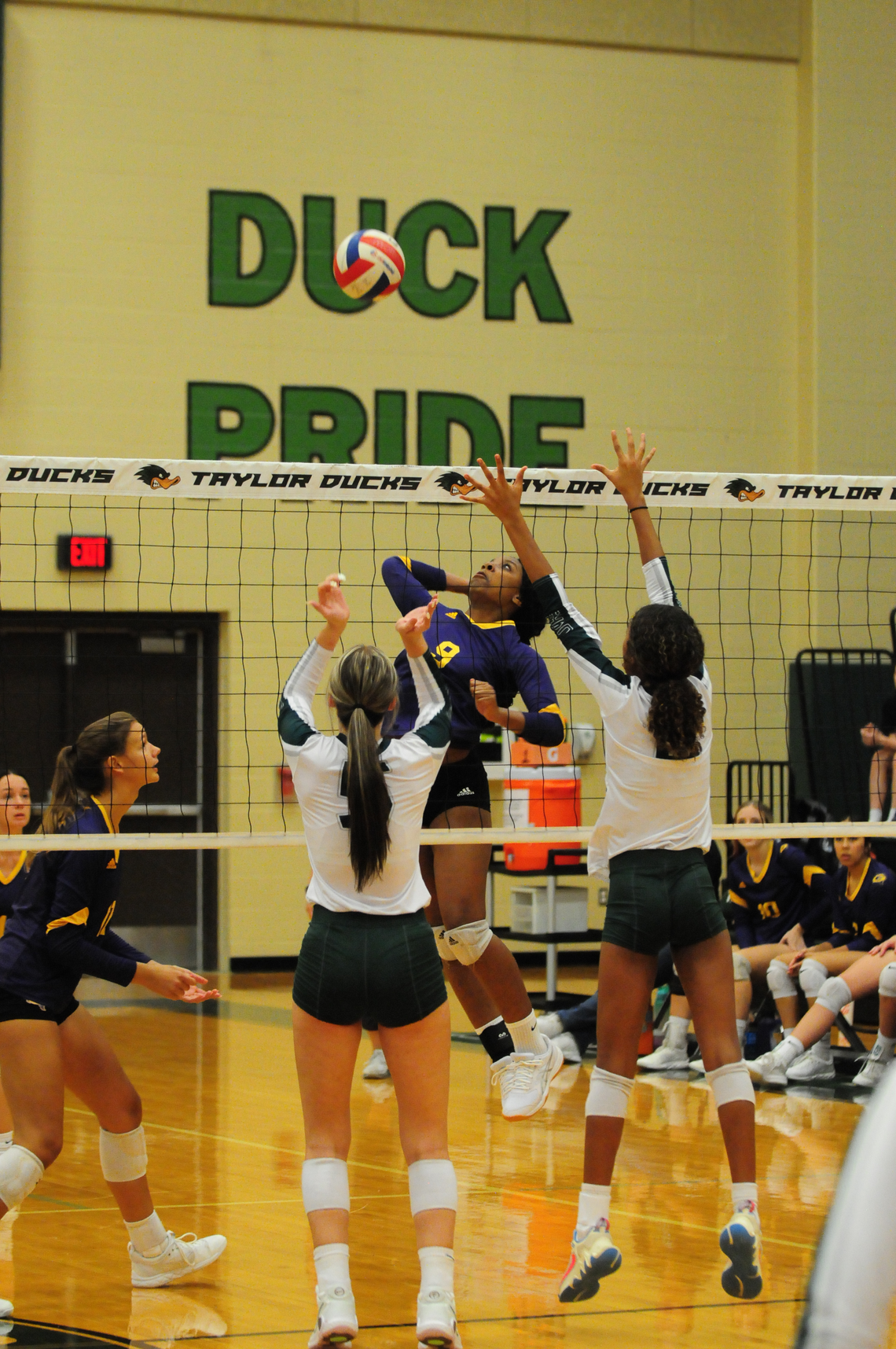 Lady Lions varsity volleyball senior Jaila Rollie gets a kill at the net during the Granger road match in Taylor