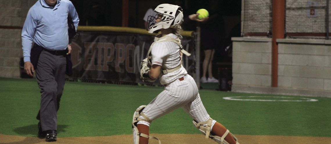 Lady Hippos sophomore catcher Riley Deroulac throwing out a runner at second base. Photo by Evan Hale