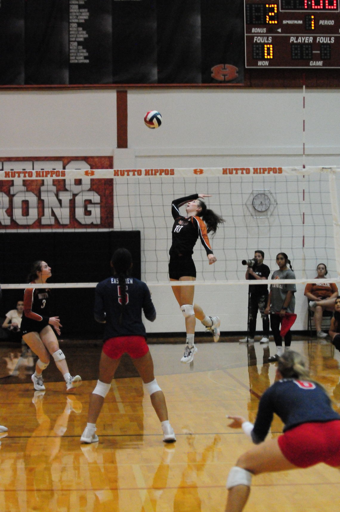 Hutto High School varsity volleyball junior Isabella Orton goes up to spike the ball on Aug. 29 during the Lady Hippos’ home match win over Georgetown East View High School. Photo by Larry Pelchat 