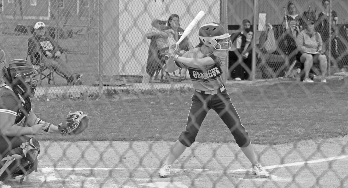 Lady Lions junior Montana Moore shifts her weight as she swings the bat looking to get on base against Holland. Photo by Evan Hale