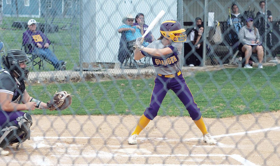 Lady Lions junior Montana Moore shifts her weight as she swings the bat looking to get on base against Holland.