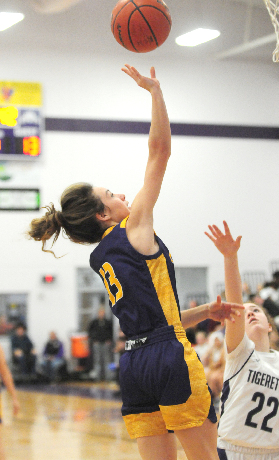 Lady Lions guard Montana Moore laying the ball up into the basket. Photo by Larry Pelchat