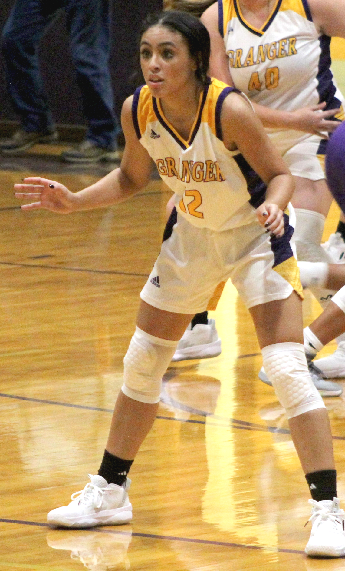 Lady Lions guard JaKayla Reese gets set in her defensive stance ready to pick up the Florence ball carrier. Photo by Evan Hale