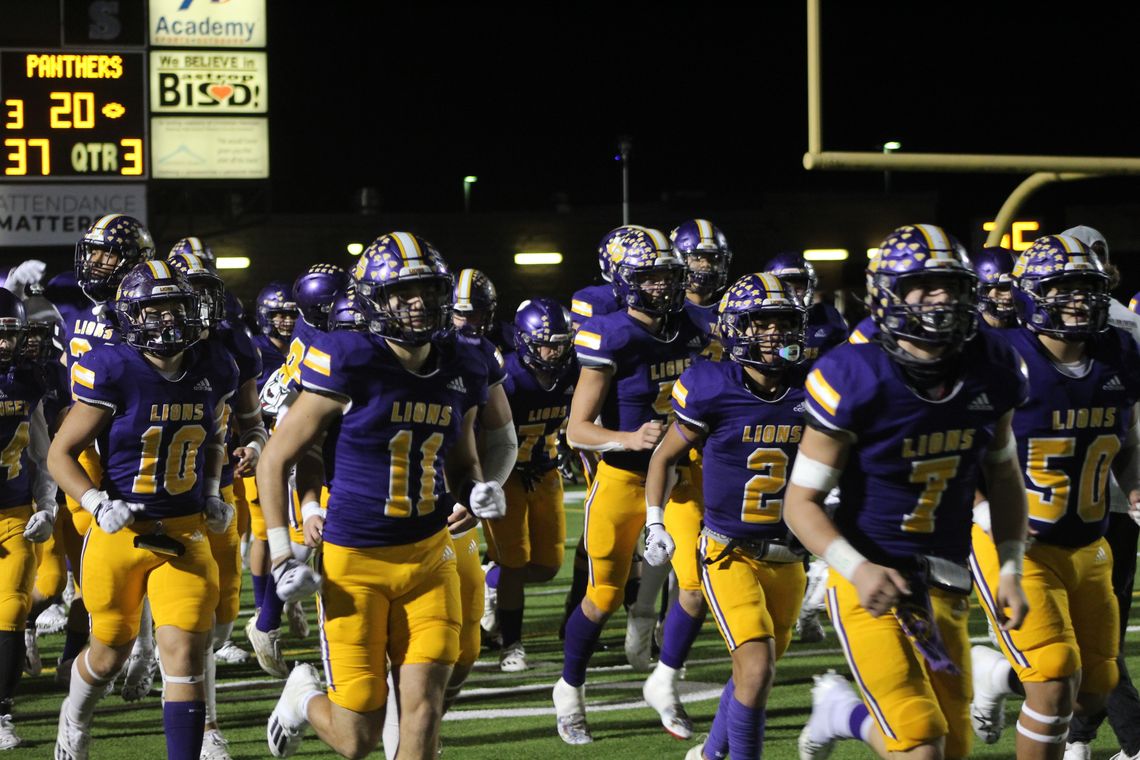 Lions taking the field to start the second half against Burton Friday night.  Photo by Evan Hale
