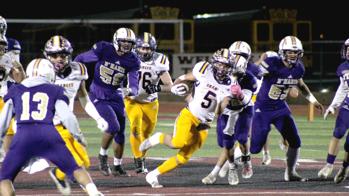 Lions' junior Chase Edwards breaks a tackle during a big run during game against D'Hanis Friday night. Photo by Evan Hale