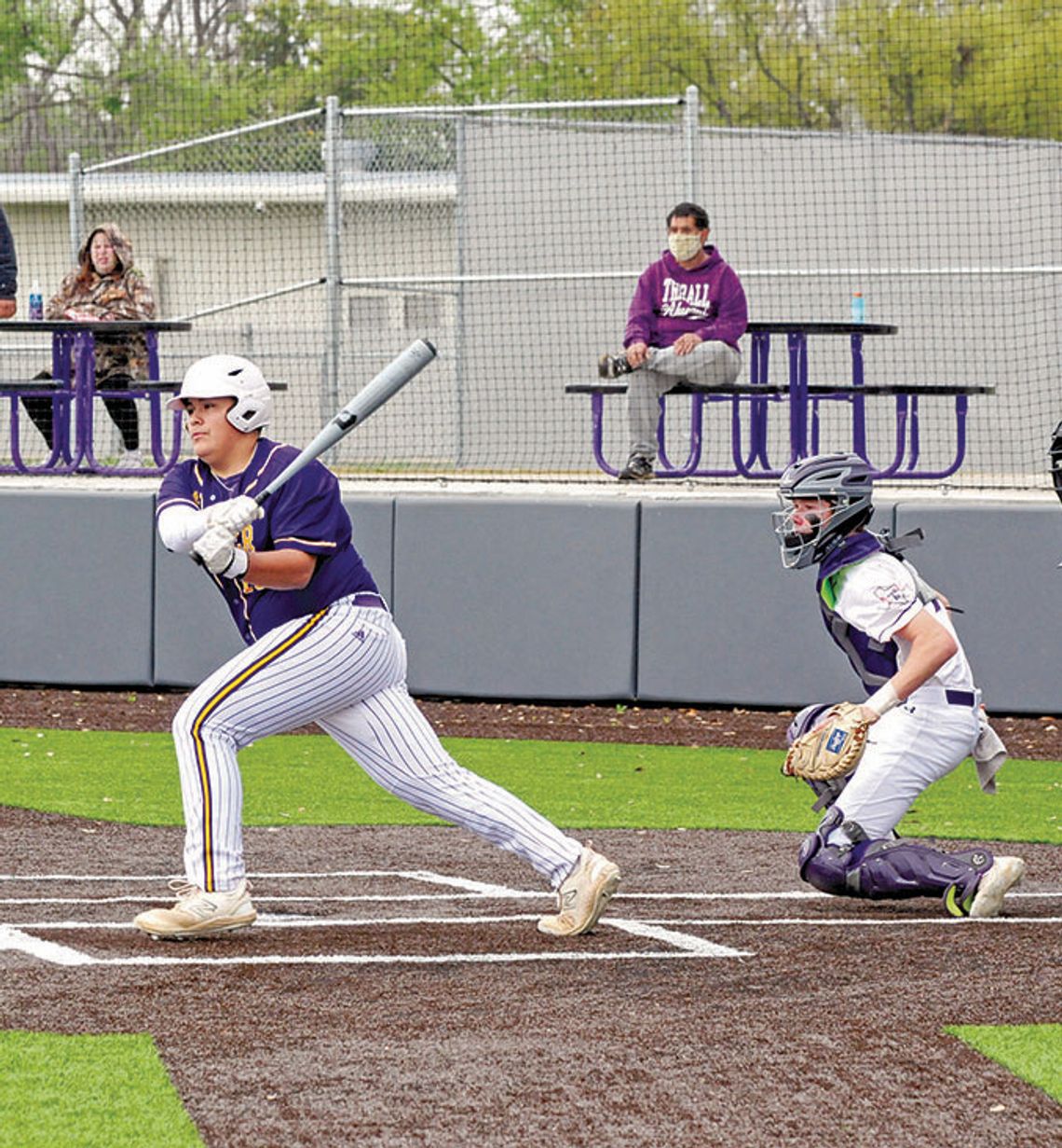 Lions win first district game