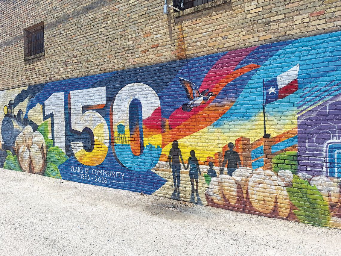 Local artist restores Taylor city mural after vandalism