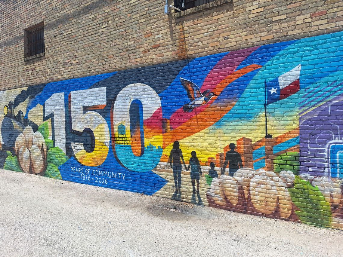 Local artists restores Taylor city mural after vandalism