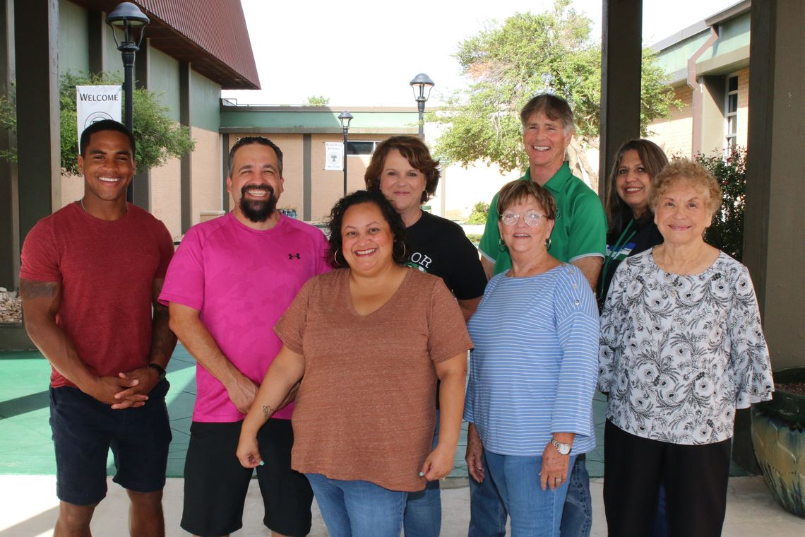 MUNCH Mentors are preparing for a new year of working with student during lunch at each campus. From left are Chris Van Buren, Adam Sanchez, Melissa Sanchez, Jennifer Patschke, Carol Bachmayer, John Matthews, Darlene Ramirez and Arlinda Hernandez. Photo by Tim Crow