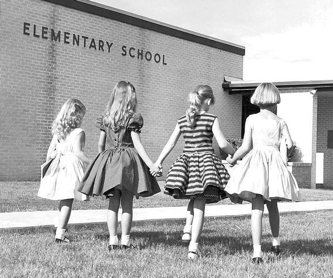 (From left) Pat Schirpik, Suzanne Klattenhoff, Susan Streit and Judy Voigt in the first day of school picture which appeared in Taylor Daily Press in 1959. Courtesy photos