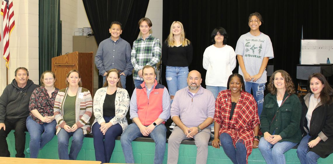 The Taylor ISD Ambassadors are greeted by student leaders at Taylor Middle School. Ambassadors were treated to a tour of the middle school campus. Photo by Tim Crow