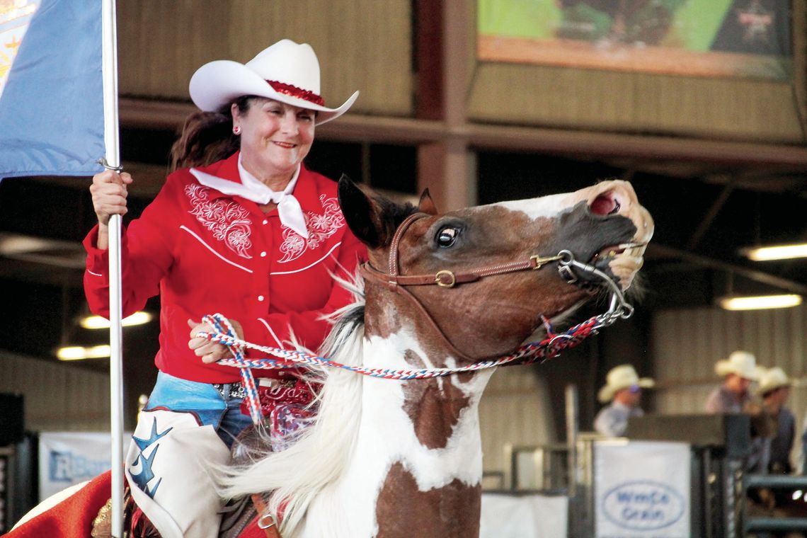 Horse rider carries a military flag during Thursday’s “Heroes Night” at the 2023 Taylor Annual Rodeo at the Williamson County Expo Center. Photos by Hunter Dworaczyk