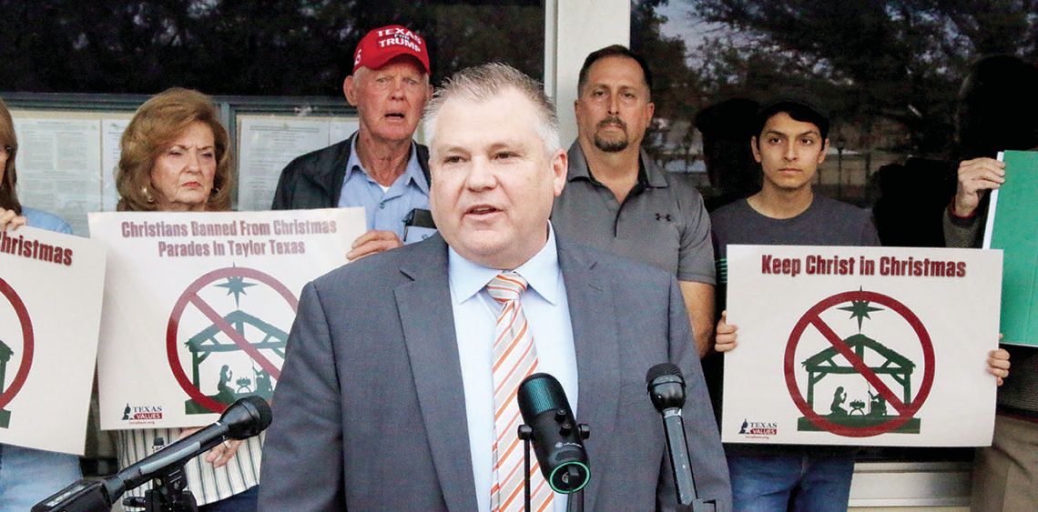 Local pastor Shane Allen, a member of the Taylor Area Ministerial Alliance, spoke during a press conference prior to the Taylor City Council meeting Thursday night. Photo by Jason Hennington