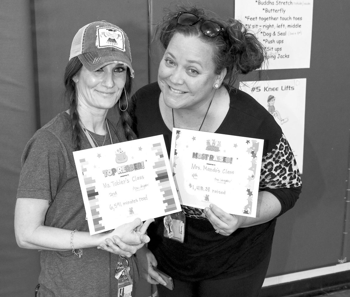 Naomi Pasemann Elementary School recently held a Read-A-Thon to raise money for the school and to celebrate reading. Pasemann teachers Jennifer Tobler and Holly Mando accept certificates on behalf of their students for the most minutes read (Tobler; 6,591) and most money raised (Mando; 1,4...