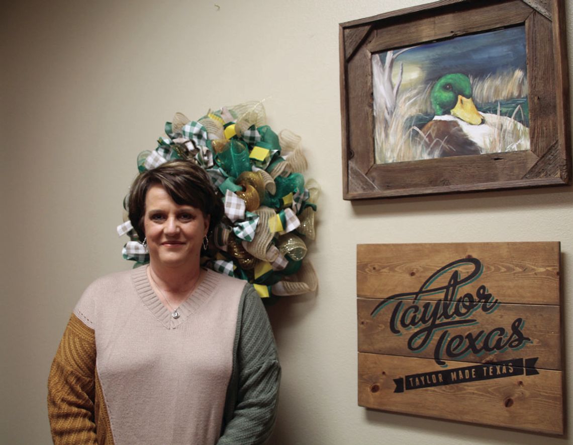 Jennifer Patschke, the new assistant superintendent of human resources and federal programs for Taylor Independent School District, poses in her office Jan. 24. Photo by Nicole Lessin