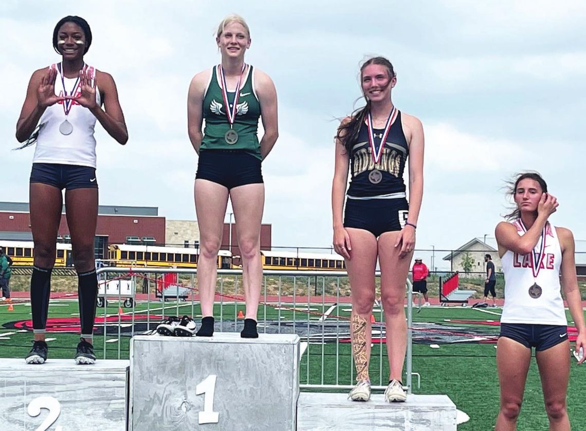 The Queen of Green Emma Whitsel (second from left) was area champion in the 100-meter hurdles and broke the school record once again running a 15.26 and advancing to the regional meet. Photos Courtesy Shelli Cobb and Earven Flowers