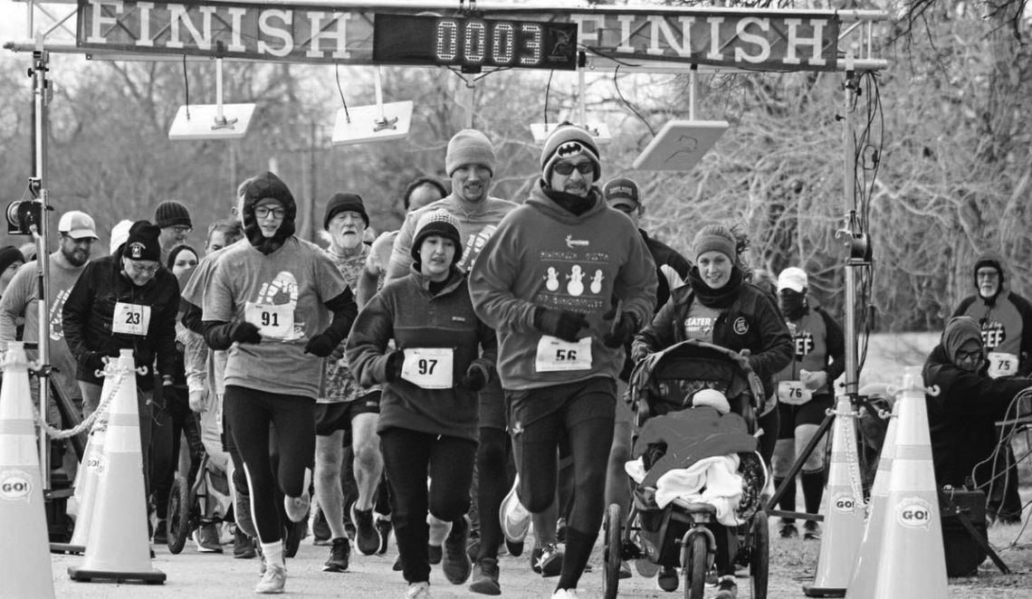 Runners take off into the chilly Saturday morning wind last year at the Taylor Garden Club Run for the Roses 5K/10K. Photo by Matt Hooks