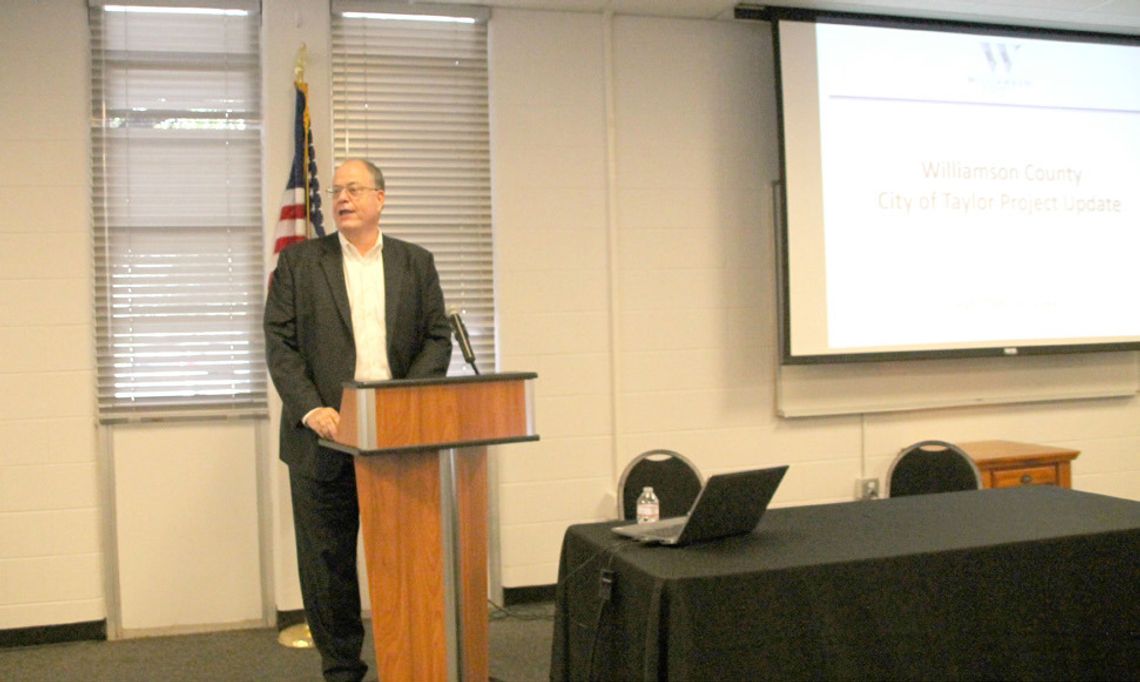 Senior Director of Infrastructure for Williamson County Bob Daigh speaks at the monthly luncheon for the Greater Taylor Chamber of Commerce Sept. 19 at the Taylor Independent School District Event Center. Photo by Nicole Lessin