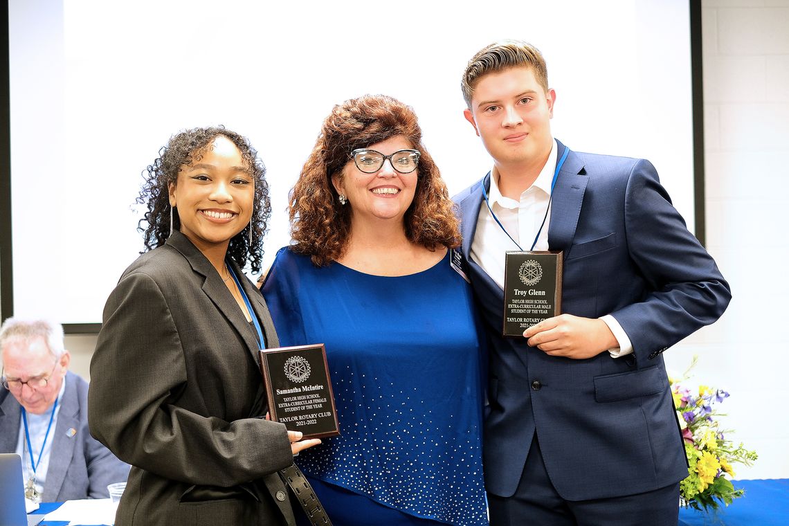 Taylor High School Extracurricular Student Award winners Samantha McIntire and Troy Glenn are pictured with Tia Rae Stone, Rotary Club of Taylor president, at a banquet May 2. The winners were selected by their teachers.Photo by Richard Stone