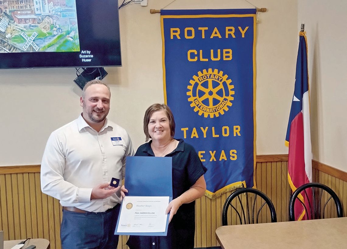 ROTARY AWARDS NEWEST FELLOW