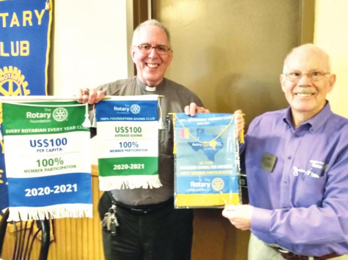 George Qualley (left) accepts the three recognitions for the Taylor Rotary Club from Jerry Chapman, past district govern. Courtesy photo