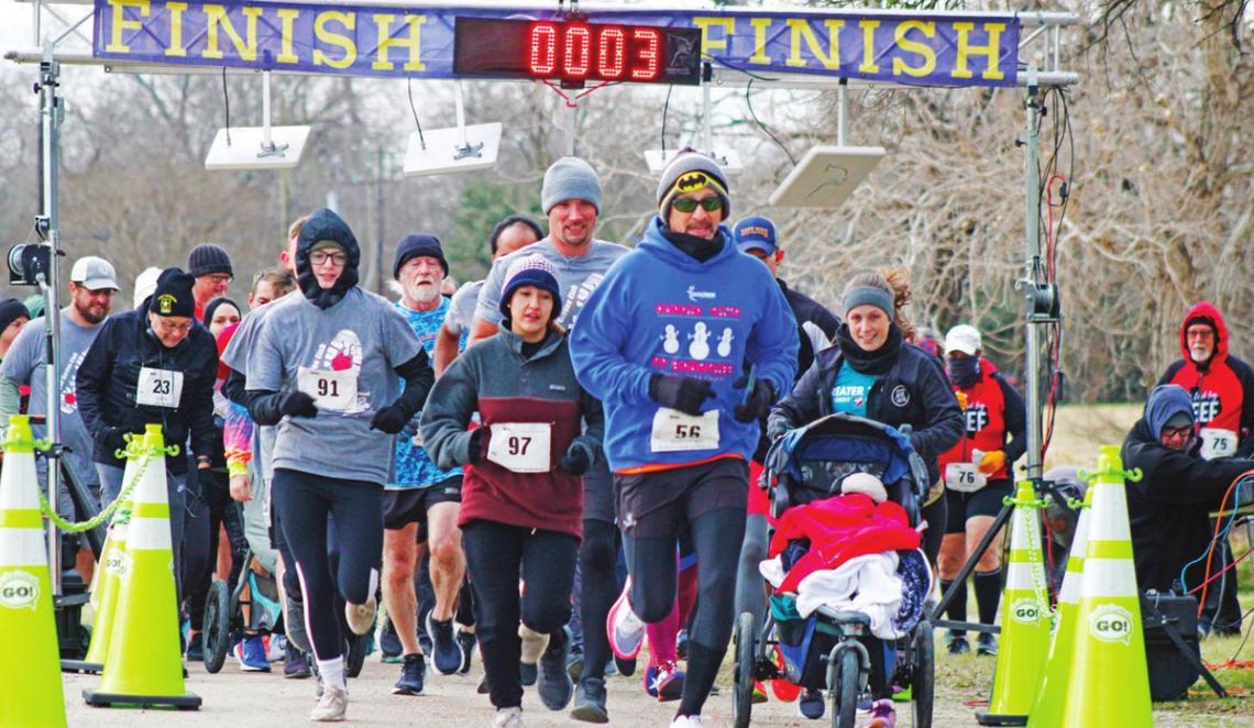 Runners take off into the chilly Saturday morning wind at the 2022 Taylor Garden Club Run for the Roses 5K/10K. Photos by Matt Hooks