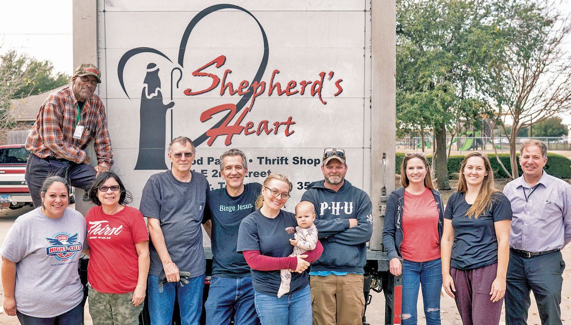 Members of the Church of the Latter-Day Saints delivered 24 pallets of non-perishable foods to the Shepherd’s Heart truck. Helping were members (from left) Amanda Lutz, Elis Nevins, Ed McGowan, Amanda Bostick, Mark St. Clair, Carolyn Wilcox, Sheri Poll and Dave Kezell. Standing on the truc...