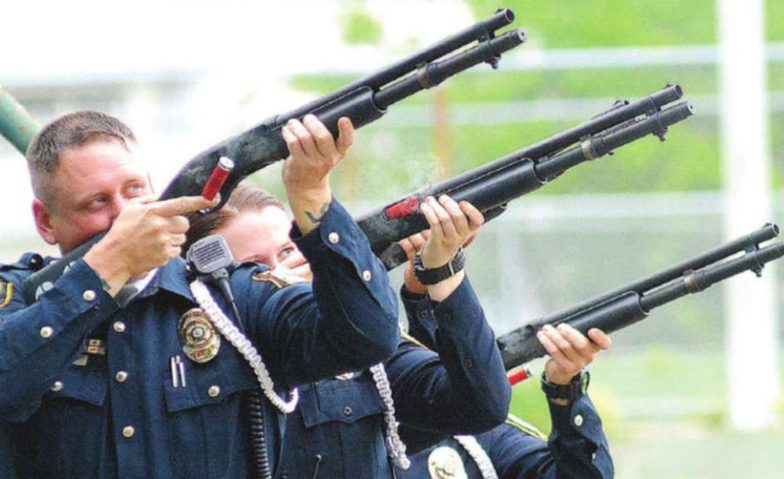 The Taylor Police Department Honor Guard offers a three-volley salute during the Memorial Day salute in Taylor May 28, 2017. File photo