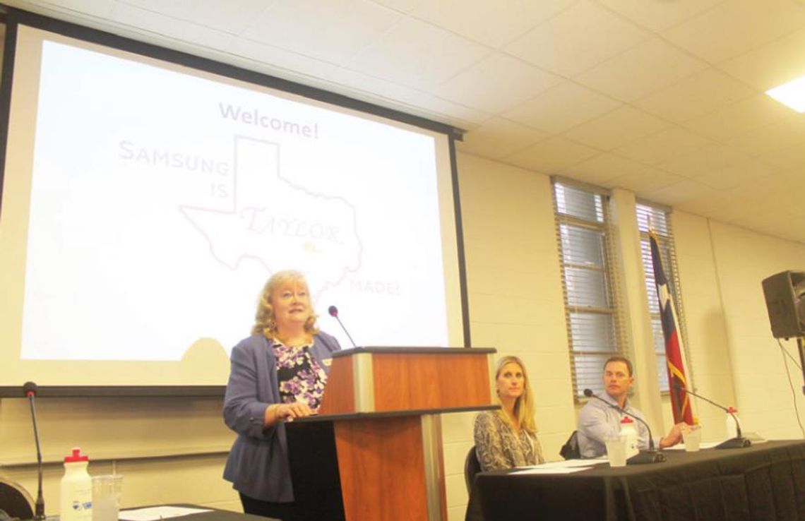 Samsun Austin Semiconductor’s Michele Glaze (left), Dana Harris and Matt Menotti talk at the Greater Taylor Chamber of Commerce luncheon March 21 in Taylor. Photo by Fernando Castro