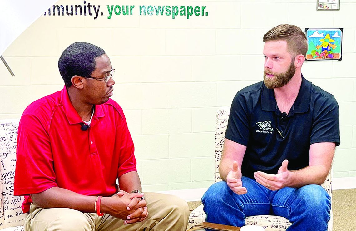 Taylor Press’ Area Editor Jason Hennington (left) visits with Morgan Cook, Taylor cemetery’s sexton and coordinator March 15. Photo by Grace Horvath