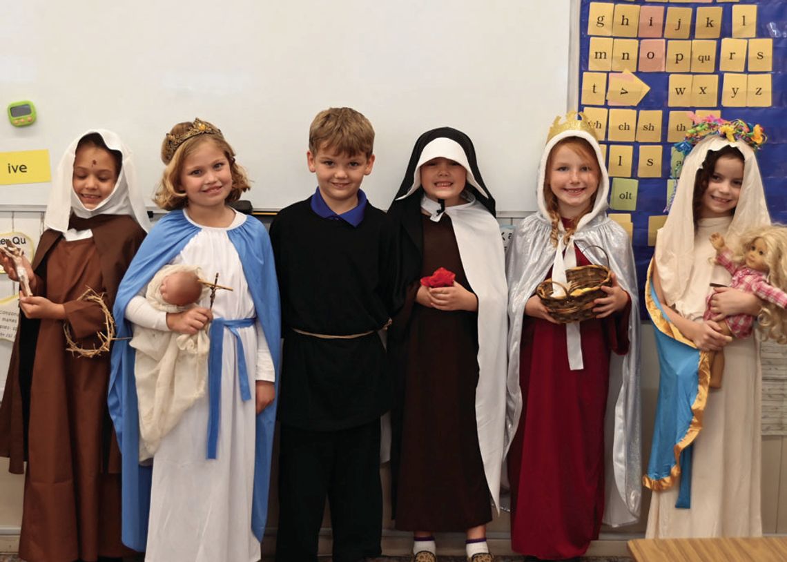 St. Mary’s second grade students show off their saint costumes. Courtesy photos