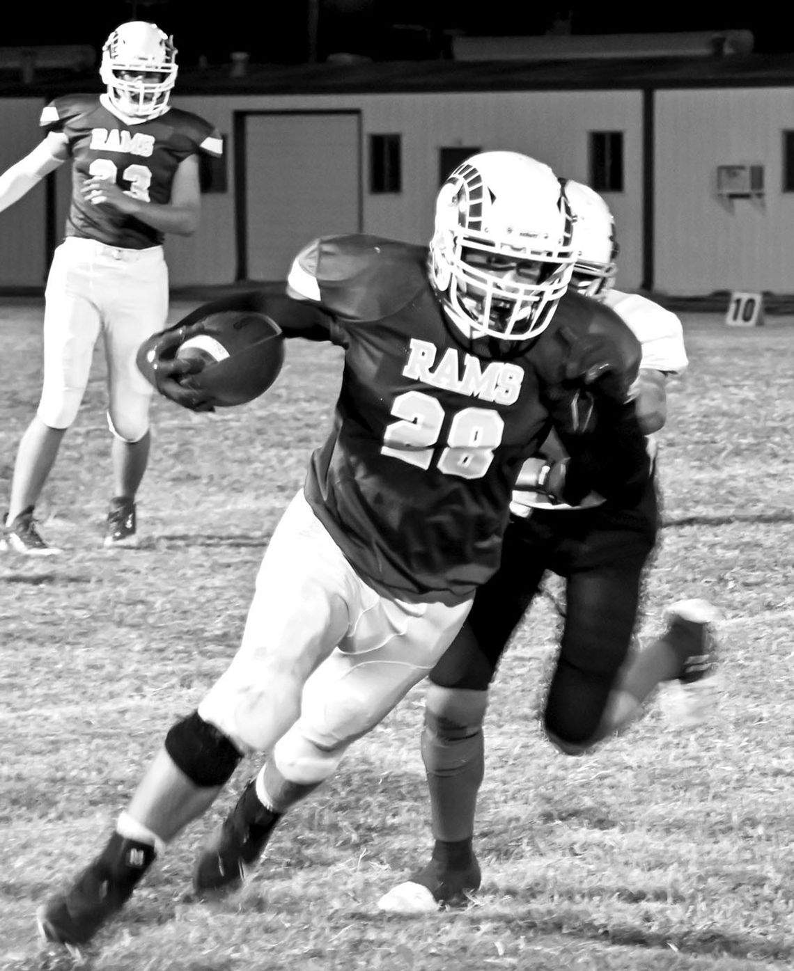 Rams’ senior Ryan Altman evades a defender to gain extra yards. Courtesy photo