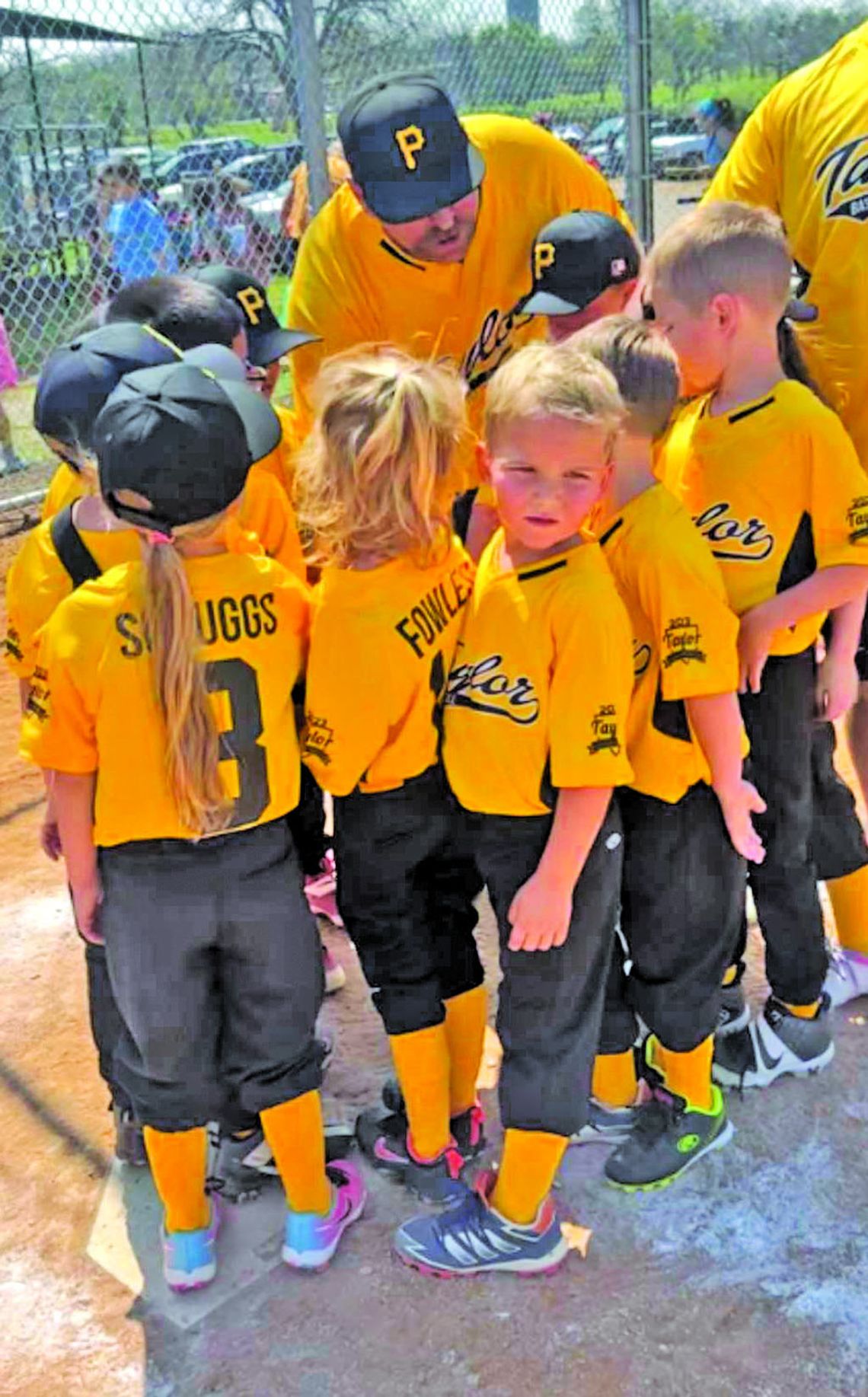 The Pirates huddling together after the game for a post-game speech from their coach. Courtesy Photo