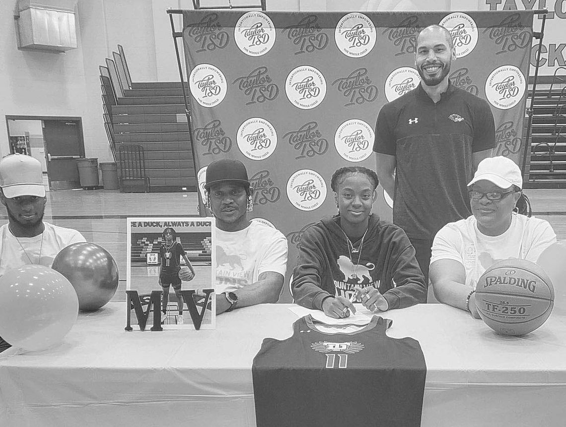 Taylor athletes sign dotted line