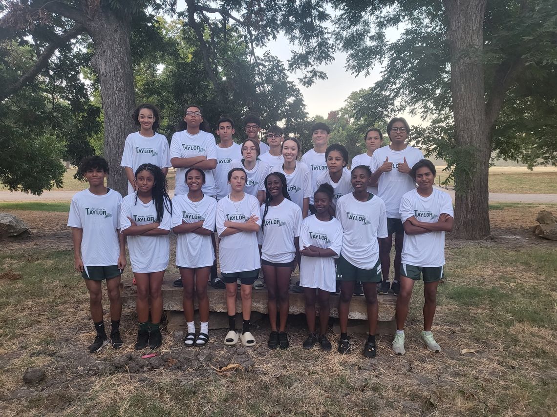 The Taylor High School cross country program gathers together for a picture on Friday, Aug. 18 during the Rockdale Invitational meet. Photo courtesy of Karmen Sanders