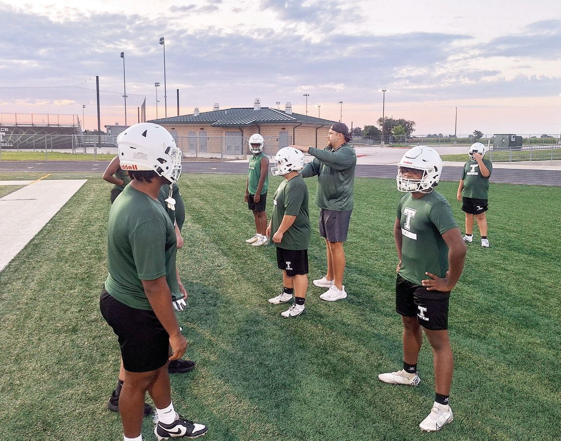 Taylor football opens fall camp with energy, focus