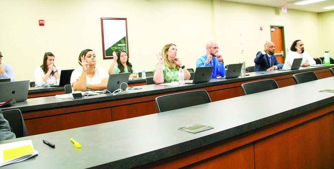 Taylor Independent School District principals listen to a presentation from Superintendent Devin Padavil Sept. 19 at the regular meeting of the board of trustees. Photo by Nicole Lessin