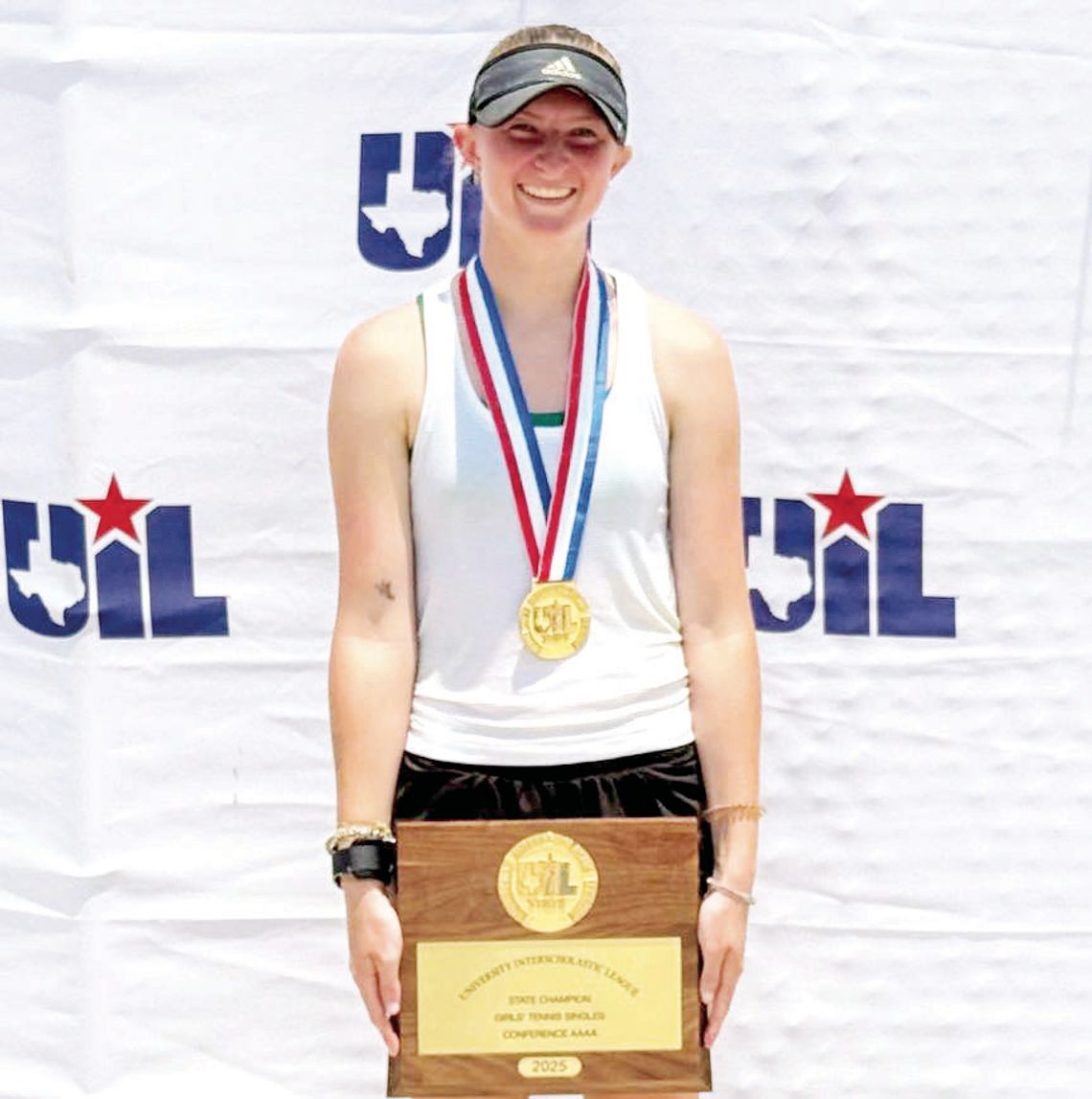 Taylor’s Michna wins third straight state tennis title