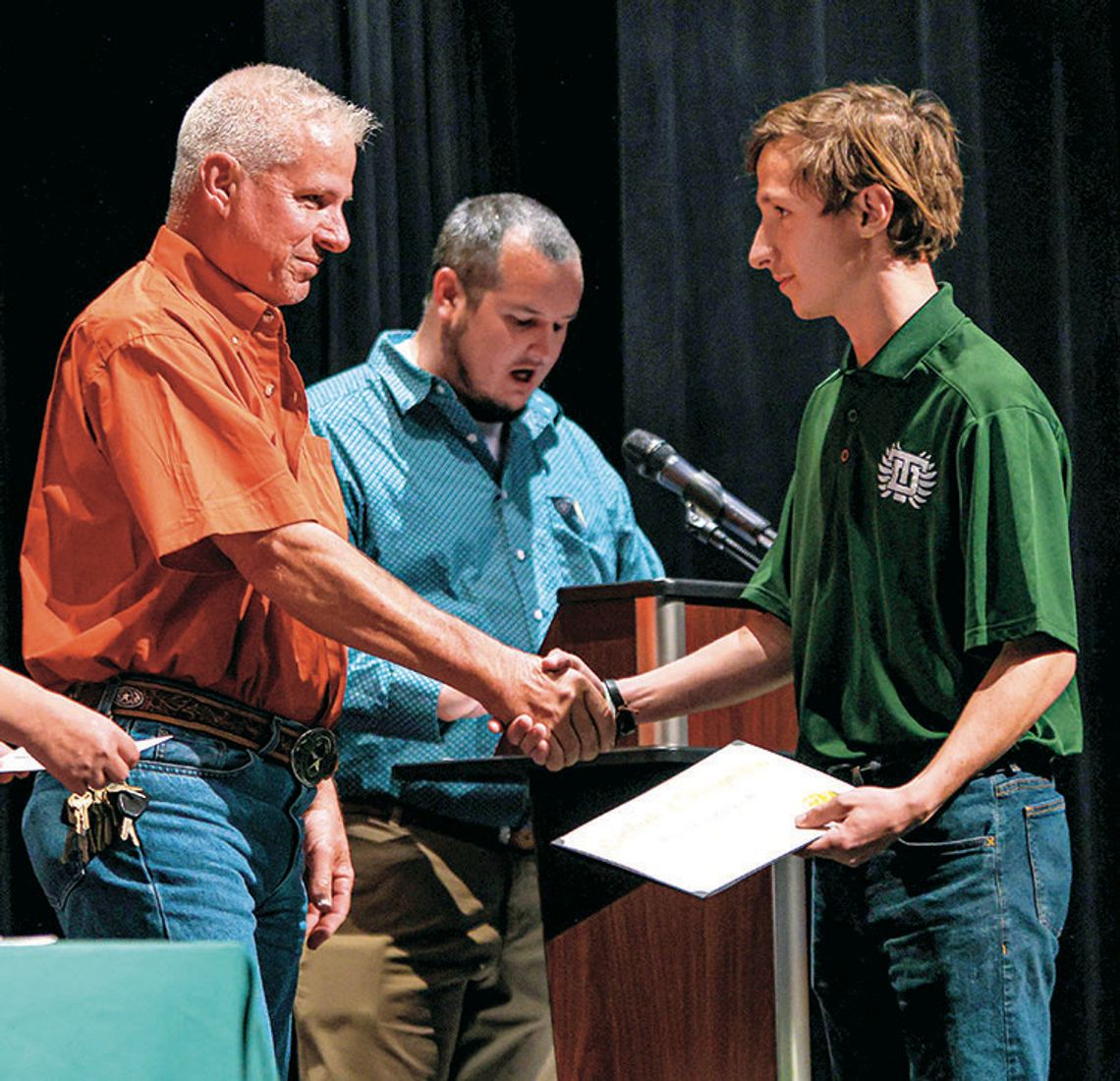 Trevor Wuensche accepts the Denisse Wuensche Scholarship in the amount of $1,000. Photos by Ryan Newsom