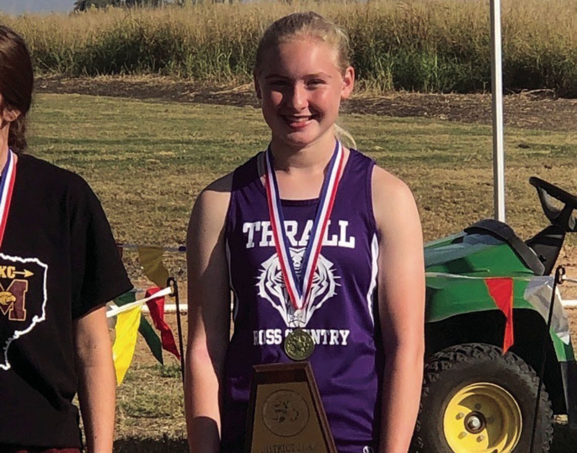 Thrall sophomore Sarah Beth Laurence poses with her awards after District 27 Championship meet Monday. Courtesy Photo Thrall ISD