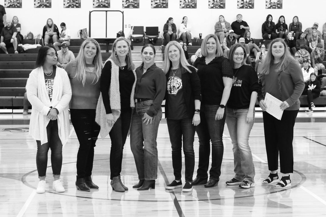 The 1992-93 Thrall Tigerettes pose for a picture together after the recognition cerenony. From left to right: Tracy Coulter Irvin, Erica Hernandez Gardner, Monica Schroeder Bowman, Donna Hejl Baldwin, Jenny Bartz Leschber, Nikki Reiger Leschber, Melissa Hines Crabb, Lauren LoLo Roberson. P...