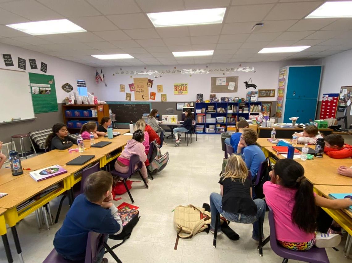 Thrall Middle School students spend time reading with Thrall Elementary School students Feb 15. Both campuses would be affected by a May bond election if a proposition passes. Facebook / Thrall Elementary School