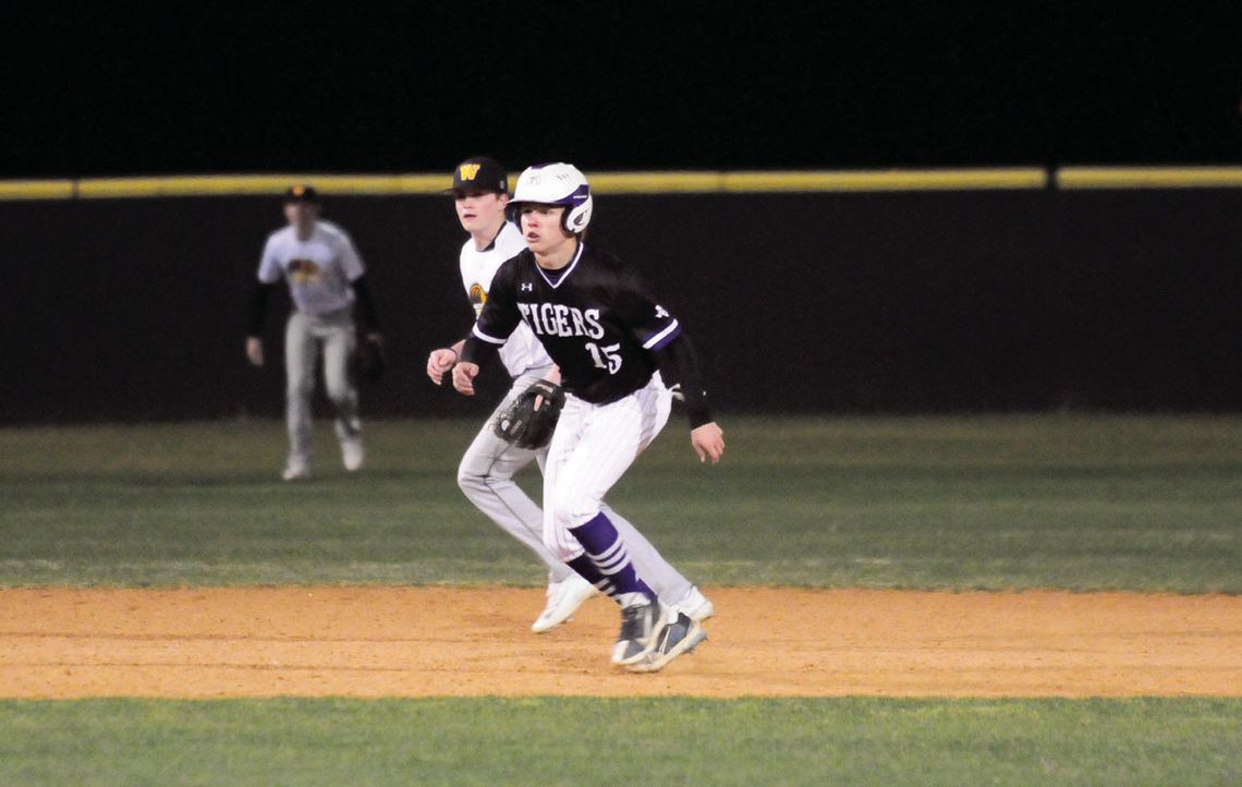 Maverick McAllister taking a lead off of second base looking to steal third.