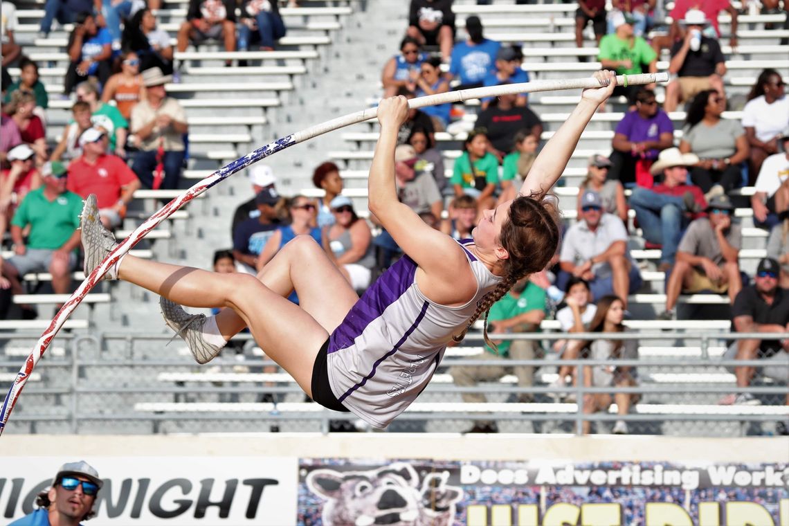 Avery Koonce soaring through the air for the pole vault event on her way to a first place finish. 