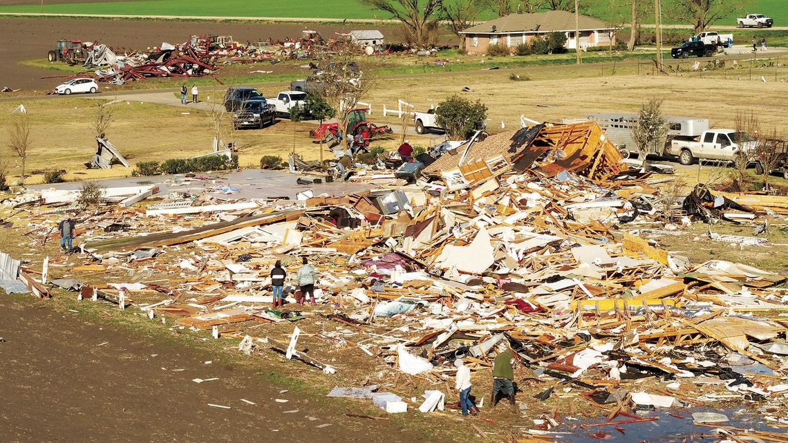 Granger residents work to clean up and rebuild after the devastation from tornados in March. Photos by Jake Ferrigan, Aerotract Geospatial