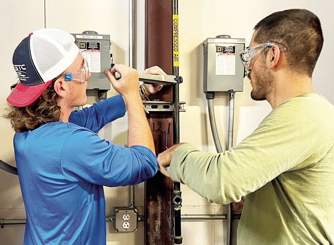 Texas State Technical College Industrial Systems students Richie Cooper (left) and Alejandro Garcia Puente install a ball valve on an air line during a recent lab session at the East Williamson County campus in Hutto. Courtesy photo / TSTC