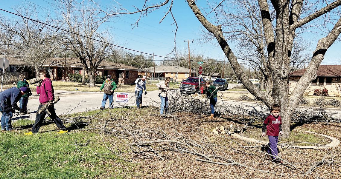 VOLUNTEERS CONTINUE CLEANUP EFFORTS